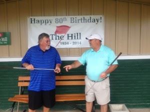 Longtime Anniston Municipal members (above L-R) Pat O'Brien and Tom Sawyer talk about old times before The Hill's 80th anniversary tournament. (Below L-R) Roger Jackson and Keith Robertson cut the birthday cake.