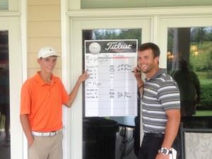 Dustin Travis (L) points out his winning score after Tour director Marcus Harrell posted it Monday. In the main photo, Harrell is flanked by winners (from left) Coleman Hayes, Travis, Raegan Thompson and Tucker Pearson.