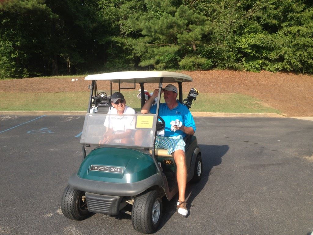 Freeman Fite (L) and Gary Wigington unwind at the end of their Cider Ridge round in last year's Sunny King Charity Classic. They were teammates then, opponents Sunday in the final round of the Wilfred Galbraith ACC Invitational.