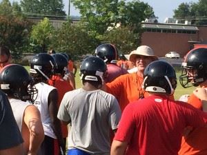 Alexandria coach Frank Tucker makes a point to his players on the first day of practice.
