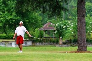 Ty Cole tries to apply some body English to a putt during Sunday's final round. 