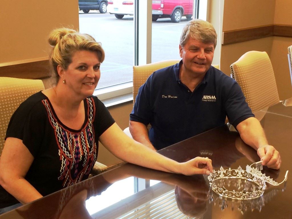 Director Don Hudson (R) and Pam Harris of the Oxford PARD sit with the crowns that will go to the king and queen of the Masters Games of Alabama Oct. 6-9.