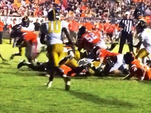 Alton Davis (far left) scores Alexandria's first touchdown on a fourth-and-goal from the 1.