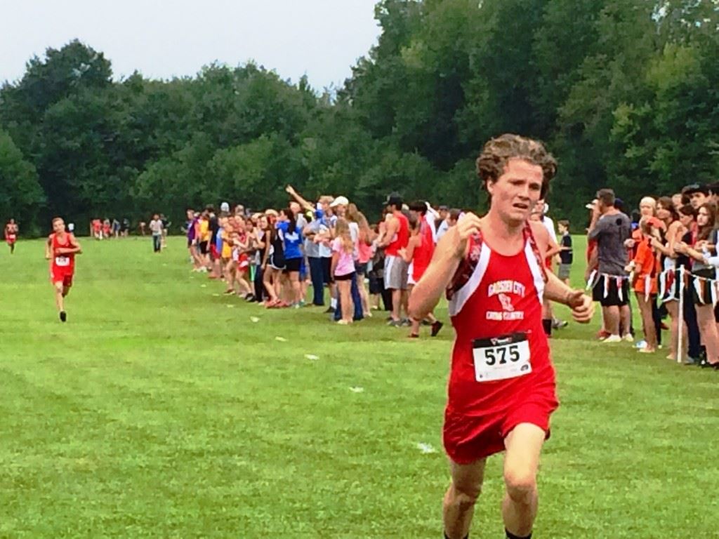 Steele Beavers of Gadsden City leads Ohatchee's Jimmy Wilson (background) across the line in the boys race.