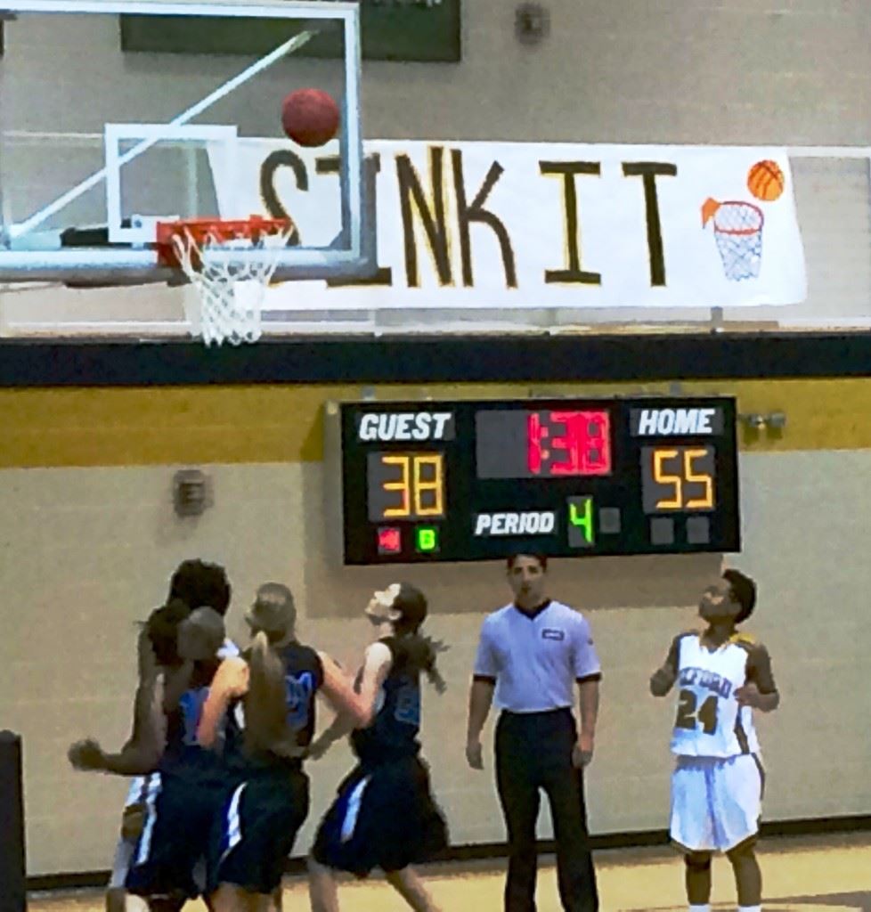 All eyes are focused on the result of this shot late in the White Plains-Oxford girls game.