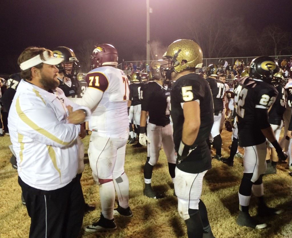 Glencoe running back Thomas Ozmint (5) takes an emotional moment after Friday's state 3A semifinals loss to Madison Academy. 