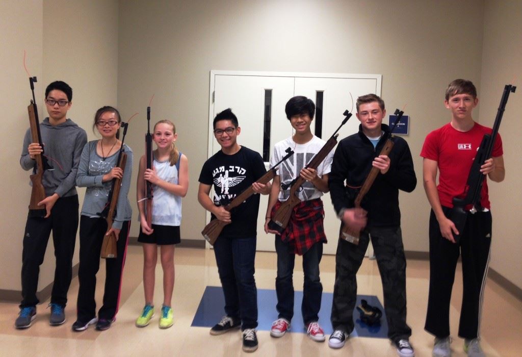 The seven shooters from Donoho's first rifle competition were (from left) HaiBing Ye, Cindy Zhou, Savannah Frickey, James Gavino, Kent Yamamuro, Tucker Sedmak and club founder Hamilton Gaines. (Photo courtesy of Jacqueline Gaines)