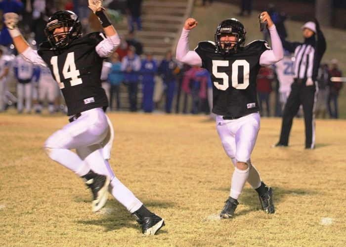 Wellborn's Dakota King (50) and Jake Thrasher (14) celebrate after King nailed his game-winning field goal out of Landon Machristie's hold (cover) in the closing seconds Friday night. (Photos by Greg McWilliams)