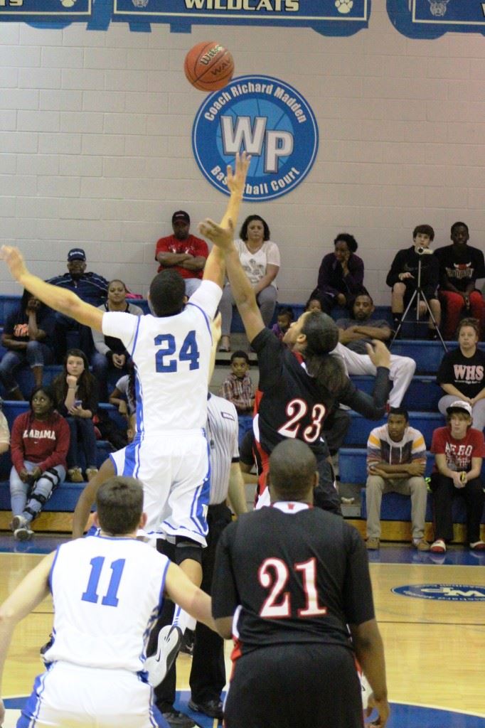 White Plains' Nathan Gilbert (24) wins the center jump and continued to be dominant all game Friday. (Photo by Micaela Truett)