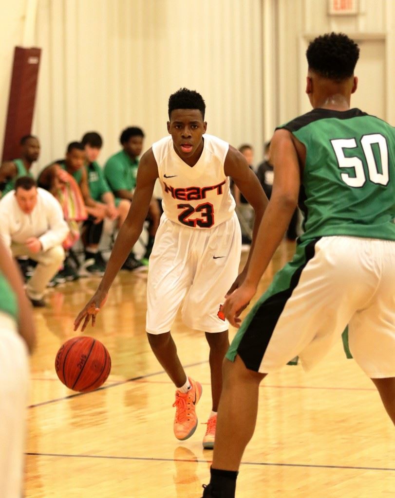 Sacred Heart's Kevion Nolan (23) is poised to drive on Leeds' Jeffrey Nolan in their game Thursday night. (Photo by Kristen Stringer/Krisp Pics Photography). 