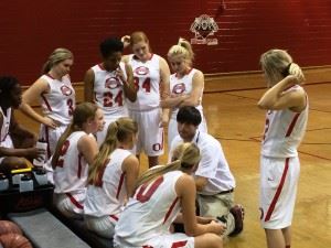 Ohatchee coach Bryant Ginn plots strategy during a time out. 