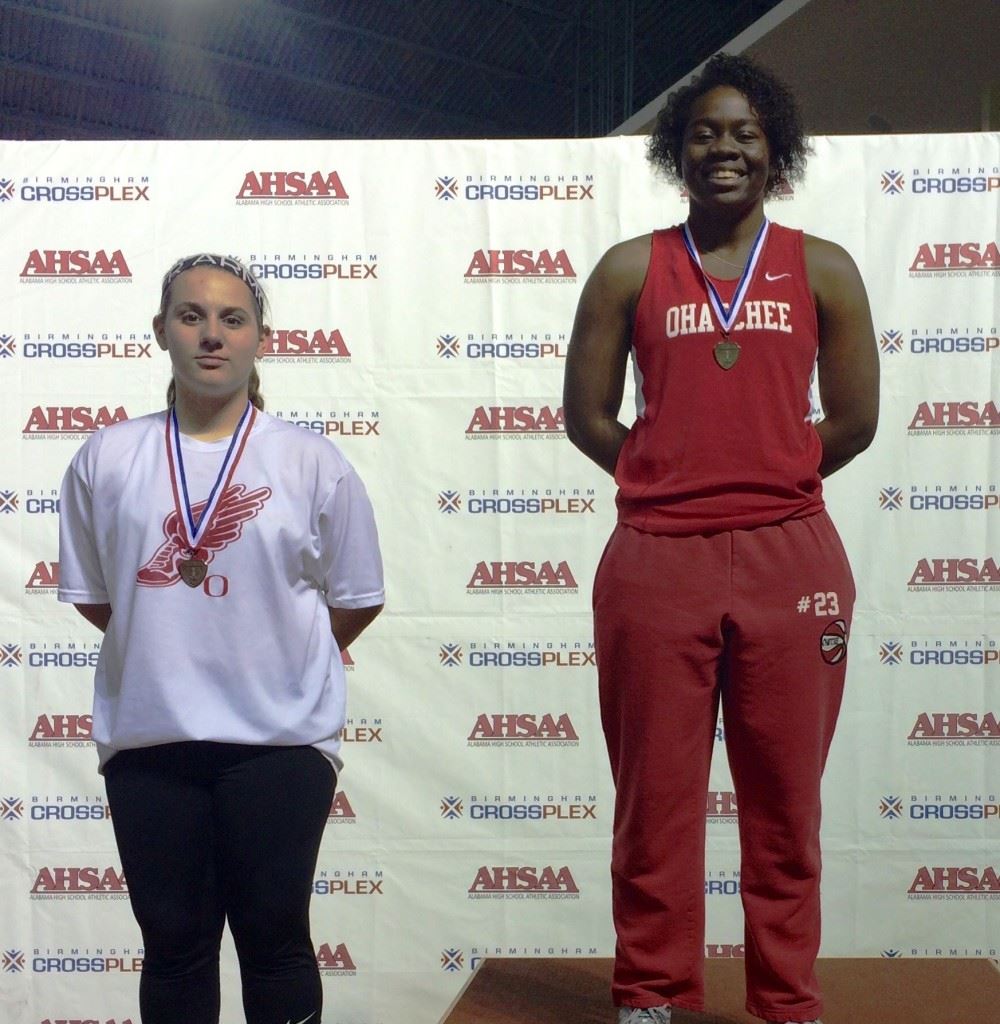 Ohatchee teammates Joria Steger (R) and Madeline Crider finished 1-3, respectively, in the girls 1A-3A shot put Friday at the state indoor track and field championships. 