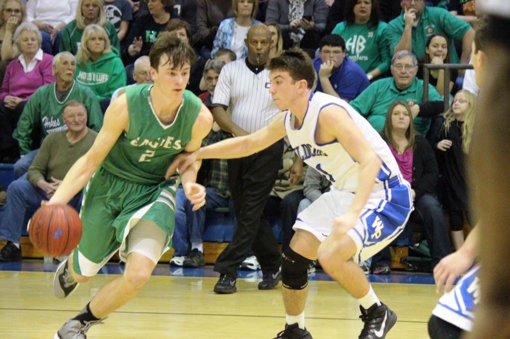 White Plains' Eli Hightower plays tight defense on Hokes Bluff's Kaden Moore (2) Tuesday night. (Photo by Micaela Truett)