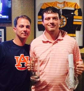 Andrew Brooks (R) displays his Match Play Championship and statistical champion trophies after they were presented  by the CCGT's Jeremy McGatha.