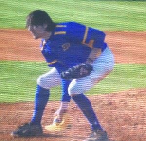 Piedmont pitcher Peyton Whitten retrieves his cap after throwing another pitch against Wellborn. (Special photo)