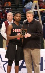 Kavarri Ross collecting his tournament MVP award.