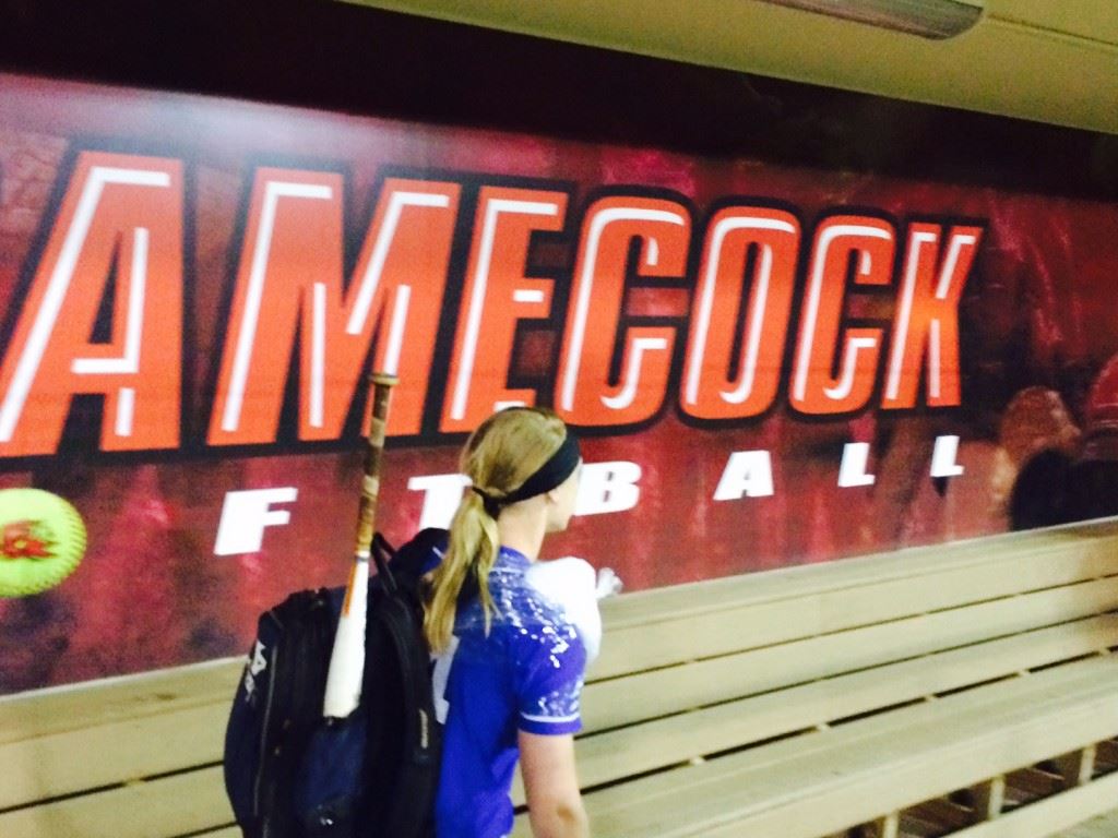 White Plains' Anna Snider leaves the Jacksonville State dugout after the Wildcats' games there Monday. The next time she's in that dugout she'll be playing for the Gamecocks.