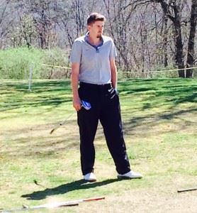 Landon Straub braves the early-morning cold in short sleeves. On the cover, Jonathan Pate prepares to pull a club on the fourth tee.