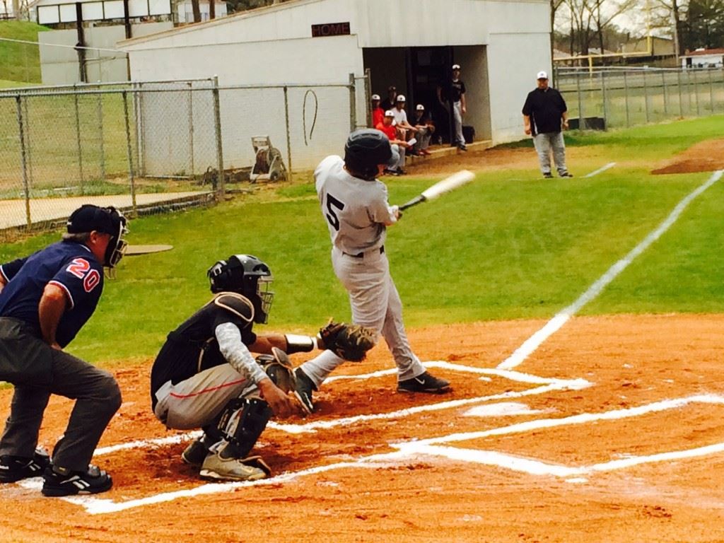 Brandt Denham connects on a solo homer in the first inning that gave Wellborn a 1-0 lead before rain suspended its game at Weaver.