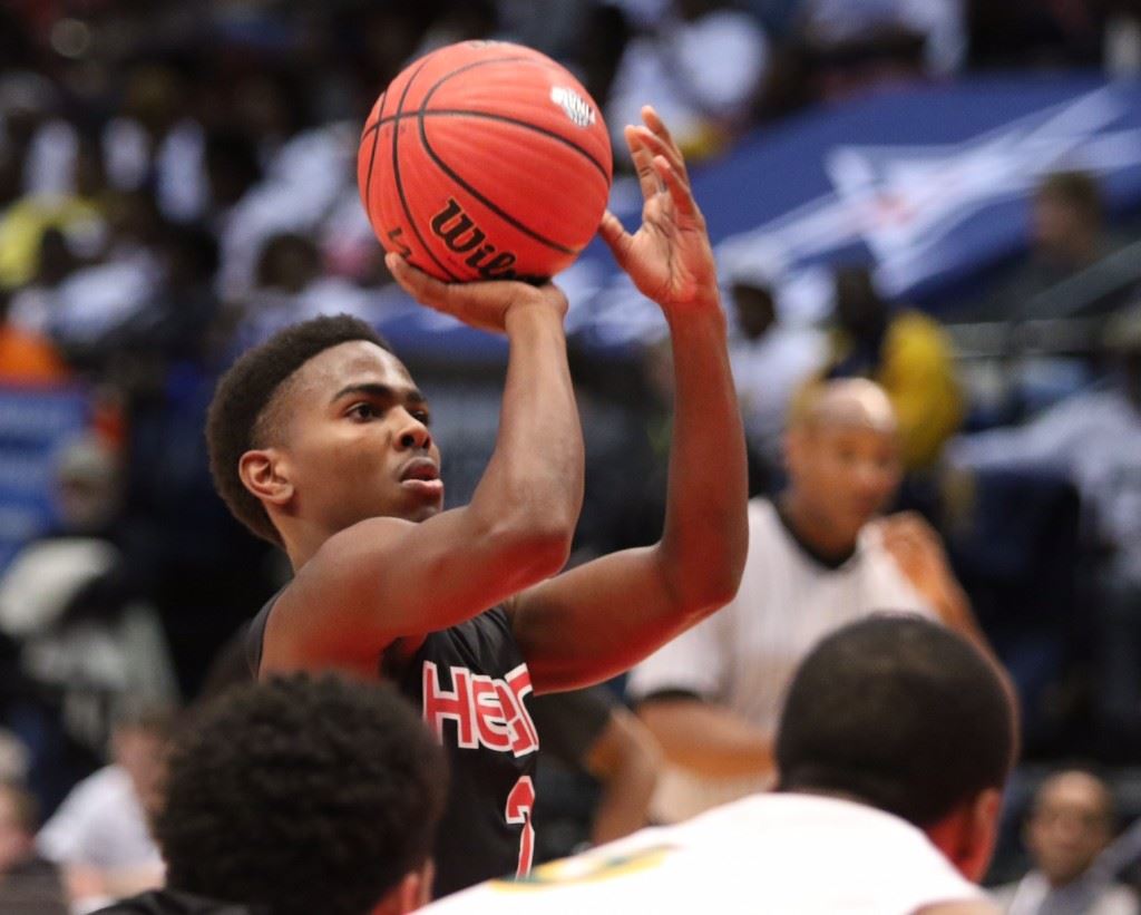 Tournament MVP Kavarri Ross focuses intently on the rim as he shoots a free throw.