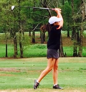 Alexandria's two-time defending champion Jordan Gregoria holds the finish on her first drive of the round Friday.