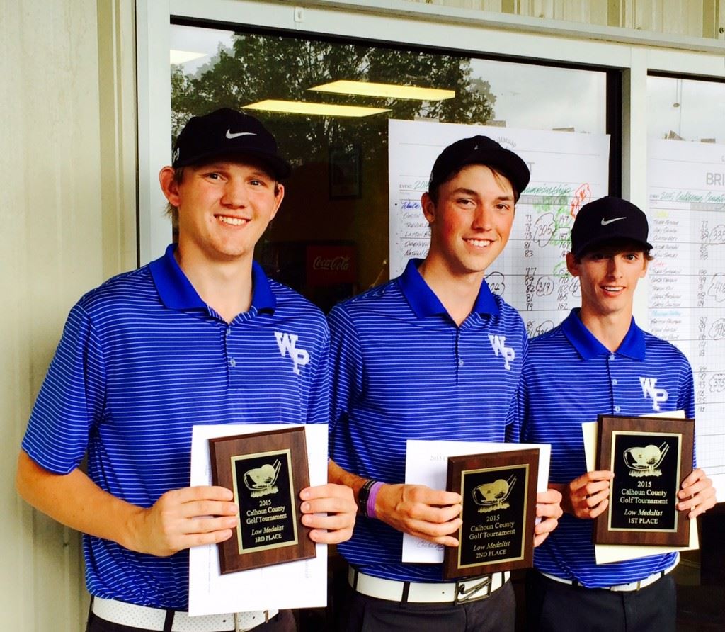 The top three medalists in the Calhoun County Boys Championship (from right): winner Dustin Travis, runner-up Layton Bussey and third-place Dylan Griggs.