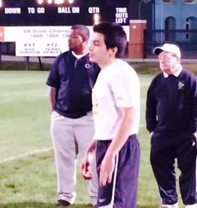 Ramiro Melendez watches the action unfold on the pitch as the Oxford coaches look on. Melendez scored four goals in the first half Tuesday.