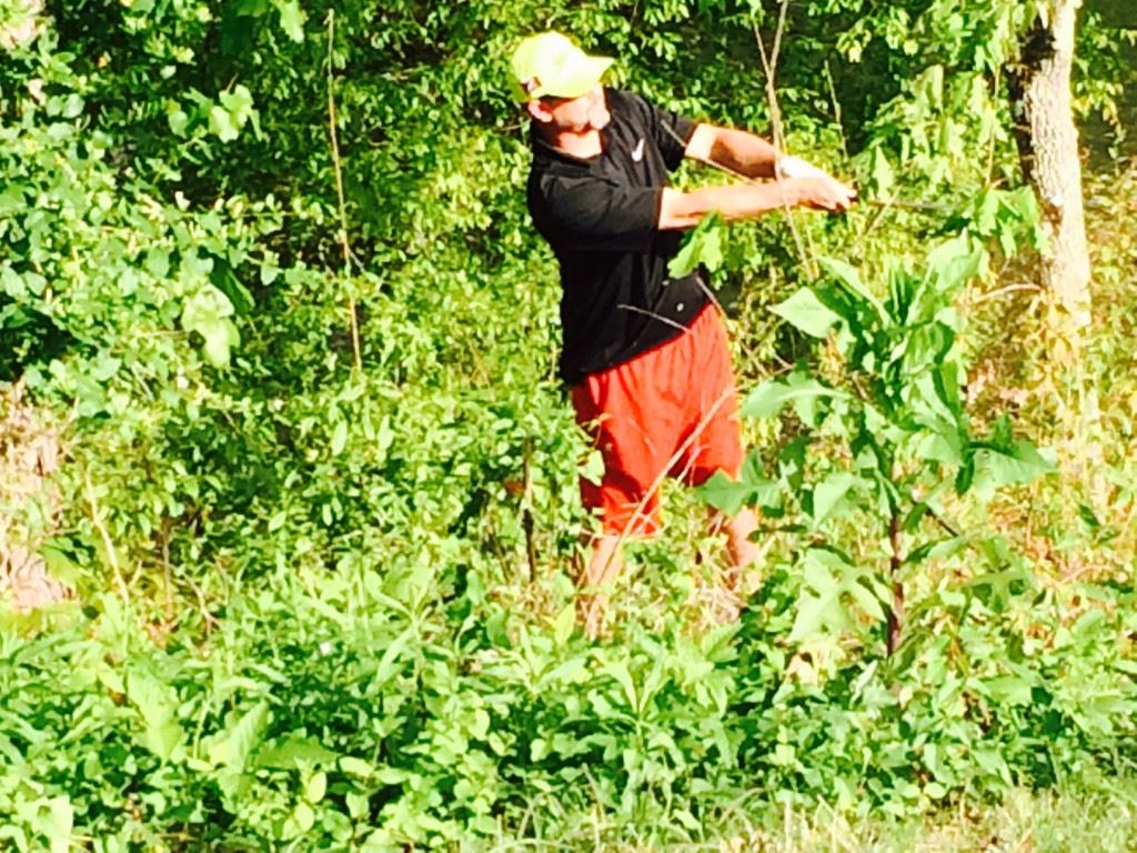 Ty Cole hits out of the hazard on 18 after finding his drive, setting up his winning birdie. (Photo by Al Muskewitz). On the cover, Cole lines up an eagle putt on No. 11 (Cover photo and all others by B.J. Franklin).