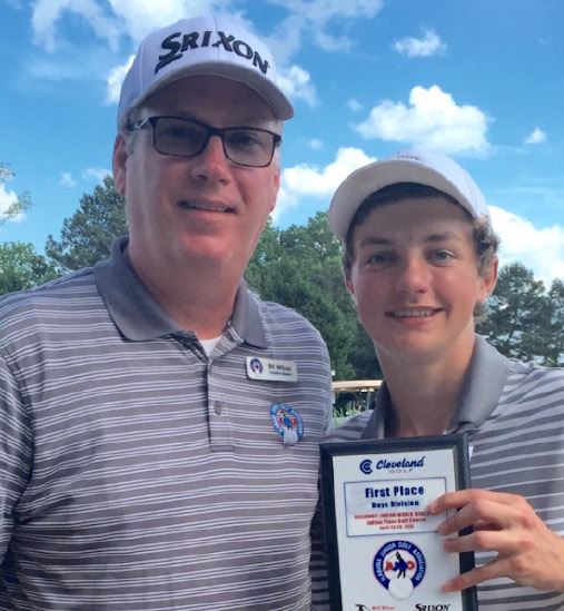 Donoho eighth-grader Jacob Lecroy stands with tournament director Bill Wilcox after winning a spot in the Junior World Championship at Torrey Pines in July.
