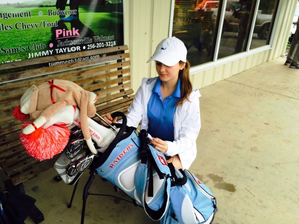 Pleasant Valley junior Madilyn Turner packs her gear after Friday's first round was suspended until later in the day.