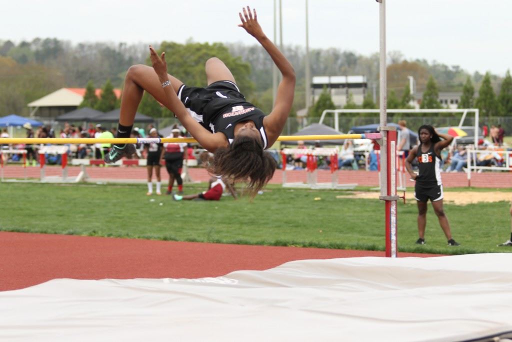 Carsheuna Curry sails over the high bar on the way to another of her three event wins. (Photo by Kristen Stringer/Krisp Pics Photography)