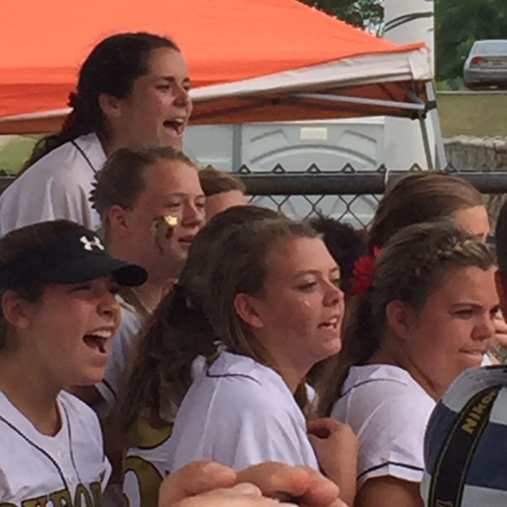 The Oxford dugout waits eagerly for the final out that clinches its trip to the Class 6A softball championship. (Photos by Greg Stone).