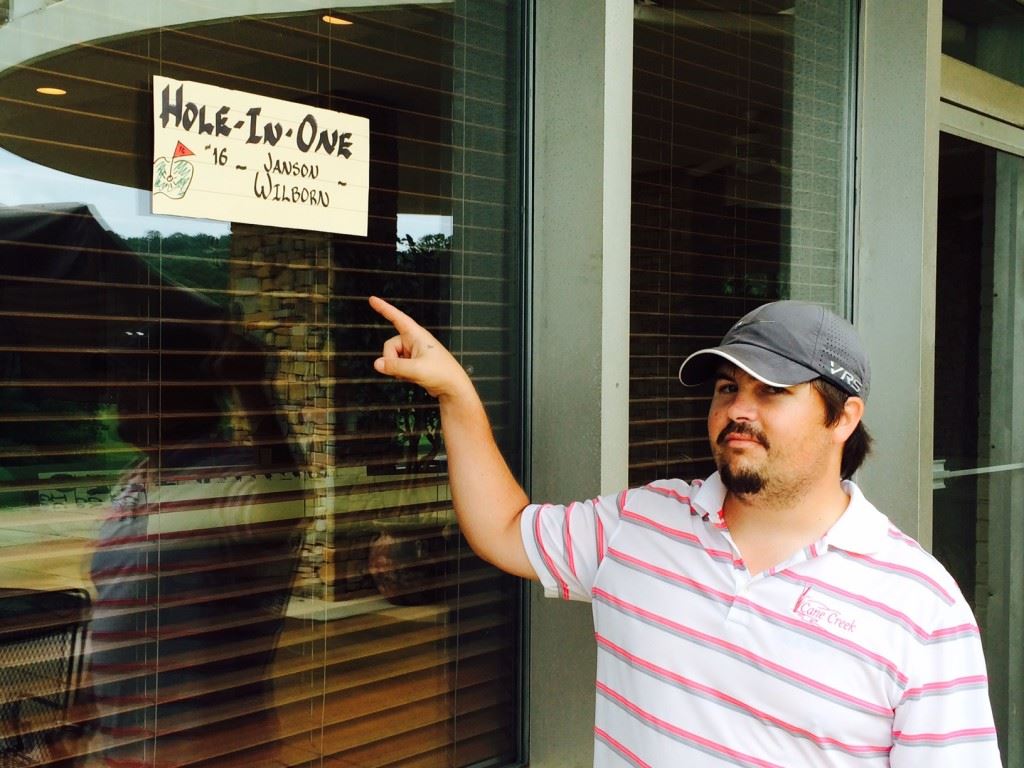 That's me! Janson Wilborn points to the sign that recognizes his hole-in-one on 16 Saturday. It was his second ace in a Calhoun County Golf Tour event this season.