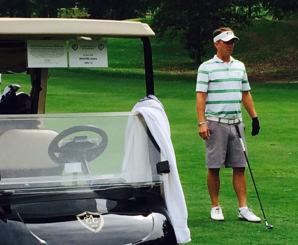 Jeremy McGatha contemplates his second shot in the 11th fairway Saturday after making eagle on the par-4 10th hole.