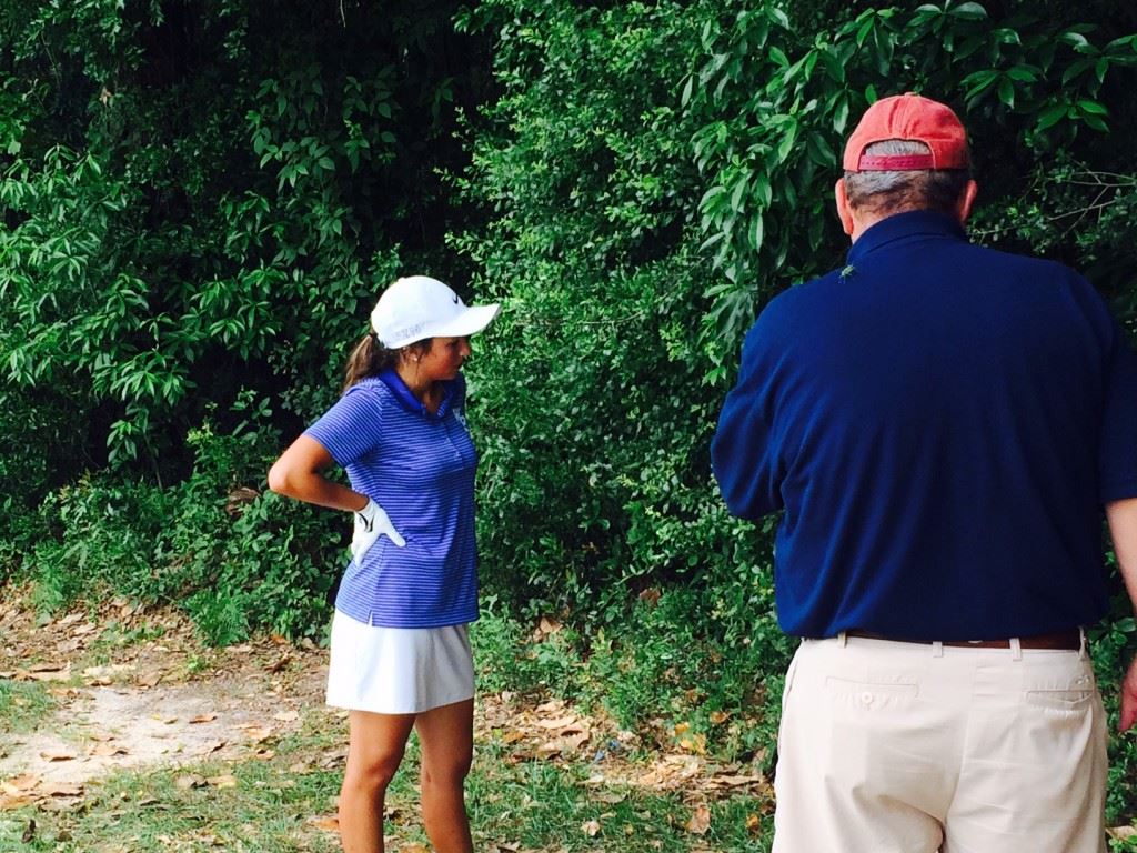 White Plains' Layne Dyar awaits a ruling on the fifth hole at Magnolia Grove's Crossings Course Tuesday. 