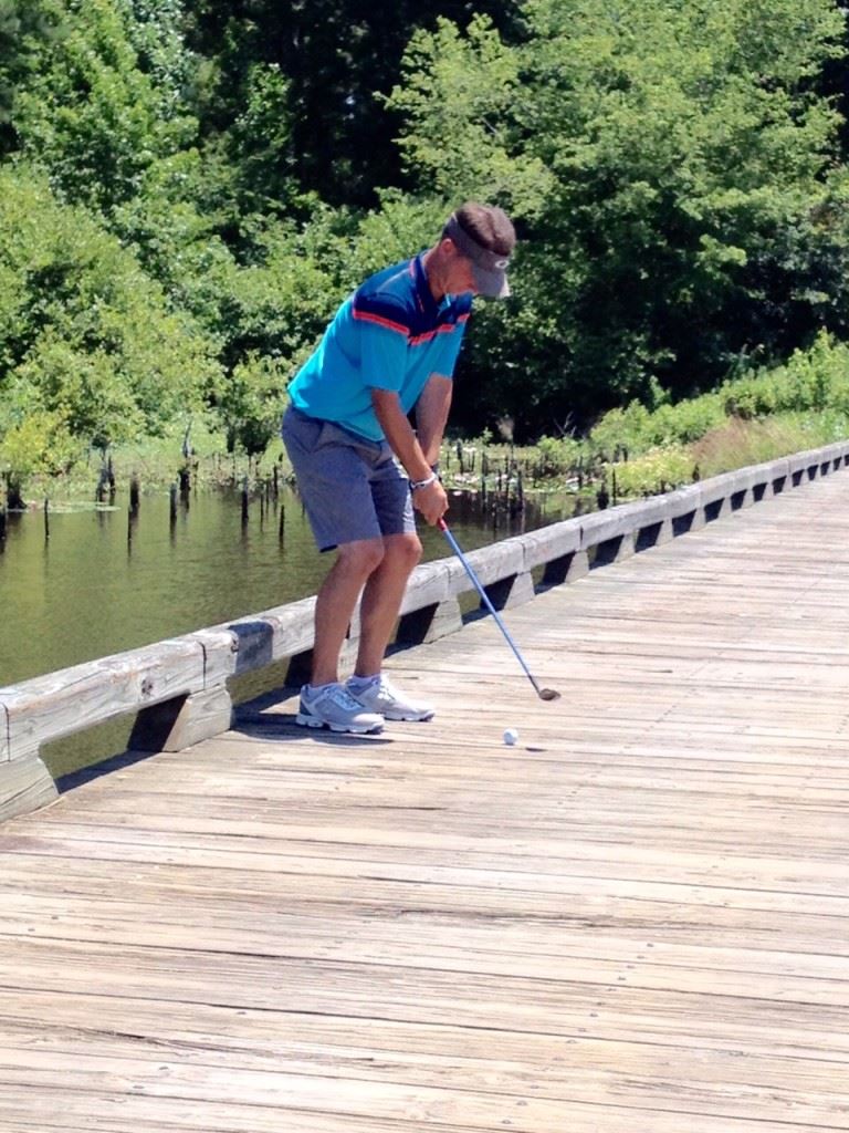 Jeremy McGatha hits a shot off the bridge on Backbreaker No. 6 at Silver Lakes. He made a double bogey on the hole,  but bounced back on the Heartbreaker nine to finish third overall. Ty Cole (cover) won by a stroke.