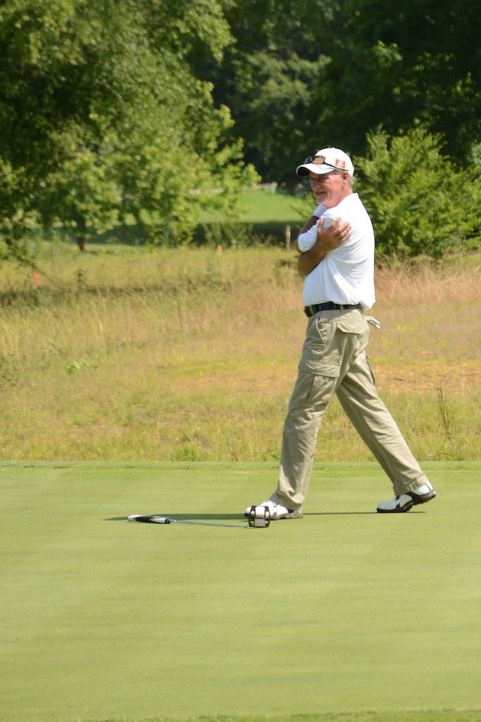 Mike Beaver reacts after watching his eagle putt on No. 9 just turn away from the cup. He tapped in for birdie, turned in 31 and finished with 67.