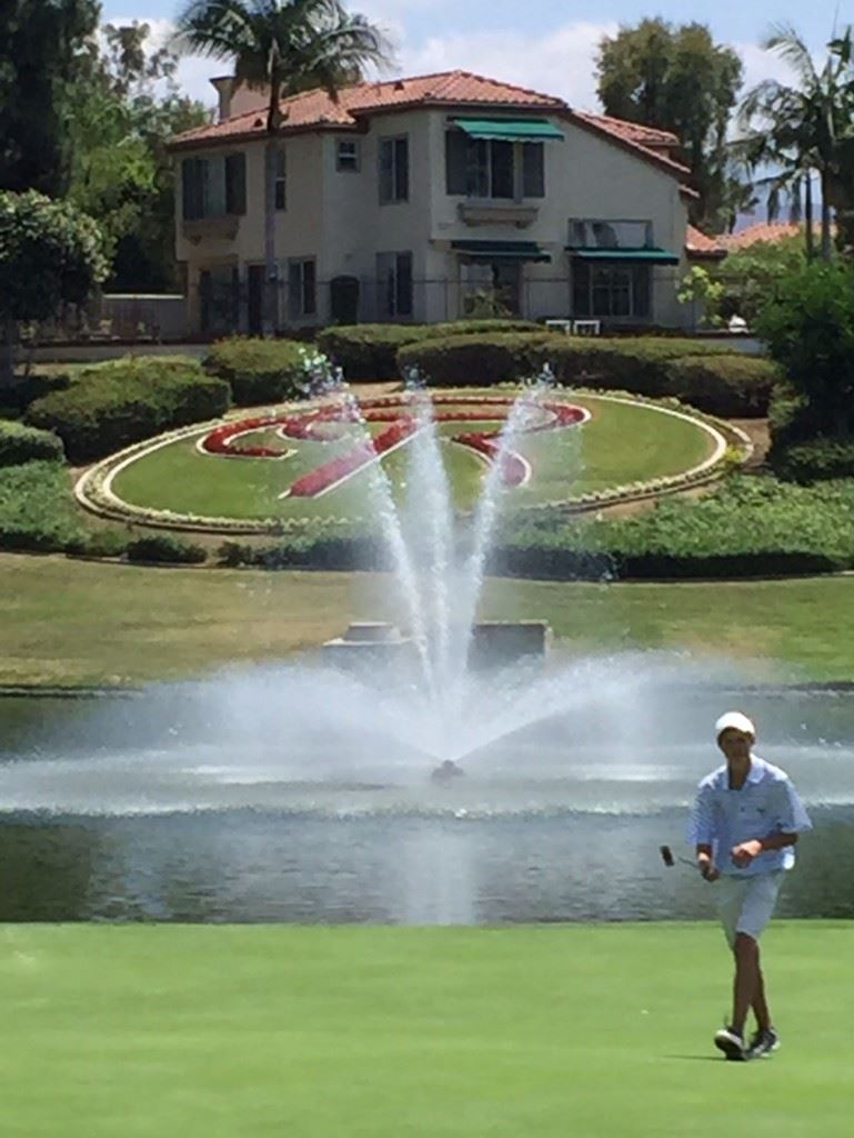 Jacob Lecroy pars the final hole of his two-week West Coast tournament tour. Below, the Donoho ninth-grader is all smiles heading to 18 after making three birdies in a row. (Photos by Lewis Lecroy).