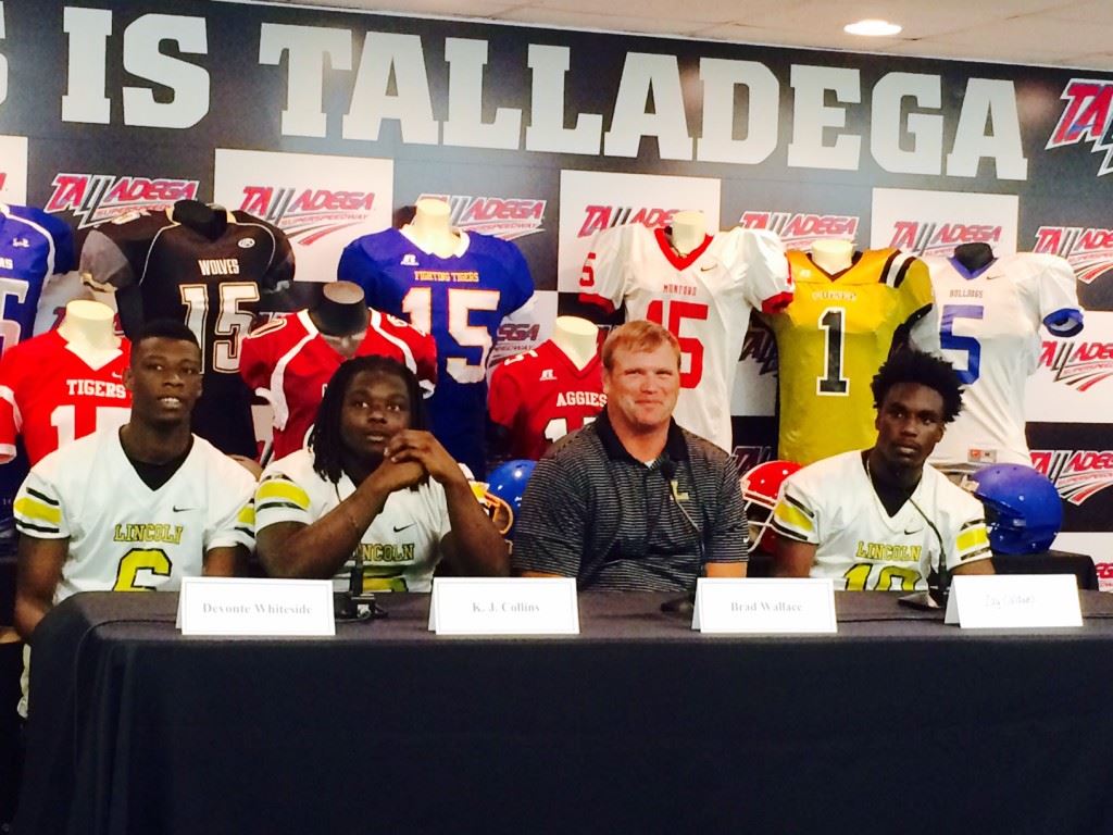 Lincoln's Devonte Whiteside, K.J. Collins, coach Brad Wallace and Zay Caldwell discuss the season ahead during Friday's Talladega County football media day. On the cover, Fayetteville's Darius Cook, Dustin Ingram, John Limbaugh and Luke Murphy talk about the team's community service efforts.