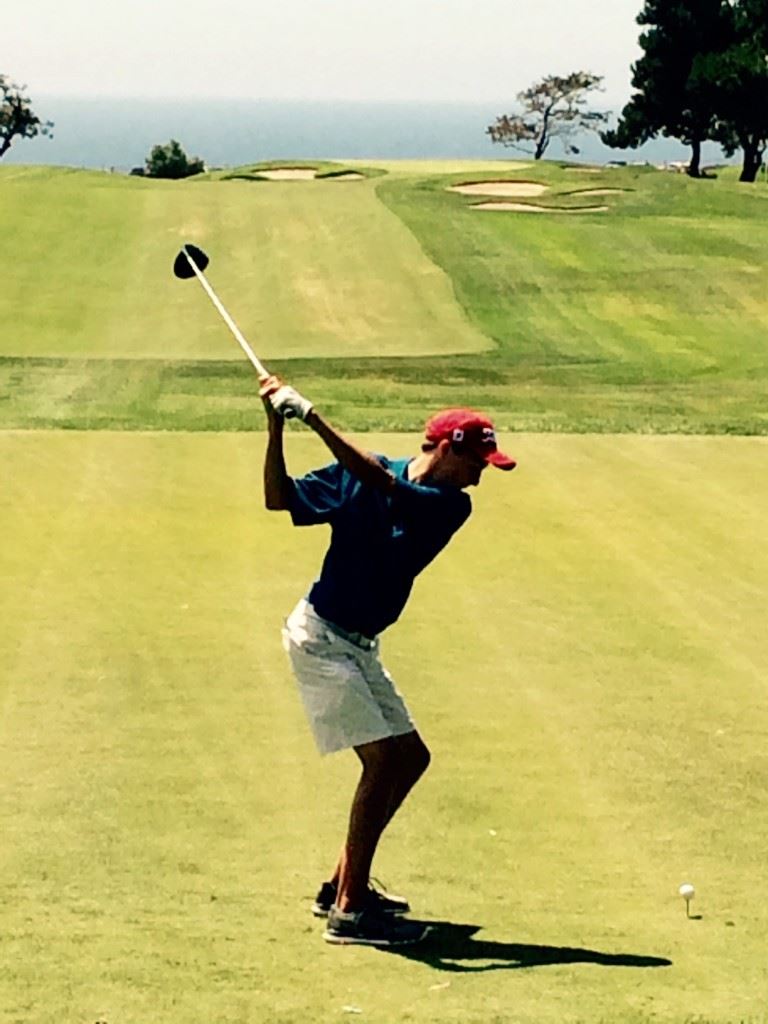 Jacob Lecroy drives into a 15-mph wind on the 470-yard 12th hole of Torrey Pines South during one of his practice rounds for the IMG Academy Junior World Championship.