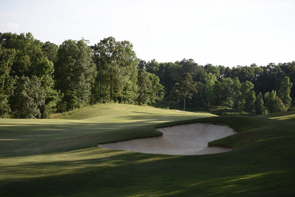 A deep fairway bunker awaits players who don't hit it straight or long enough off the 18th tee. (Photo by Sandra Howell)
