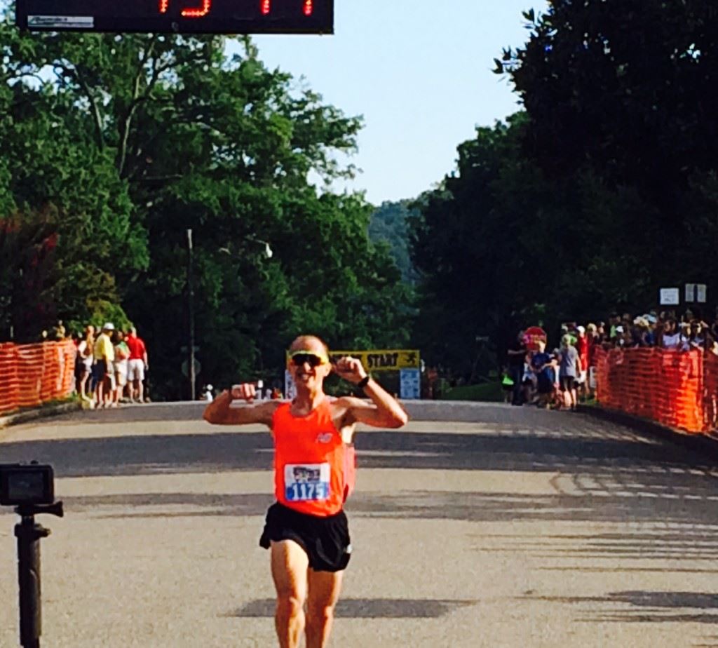 Woodstock winner Josh Whitehead of Madison leads a field of nearly 1,600 runners to the finish line.