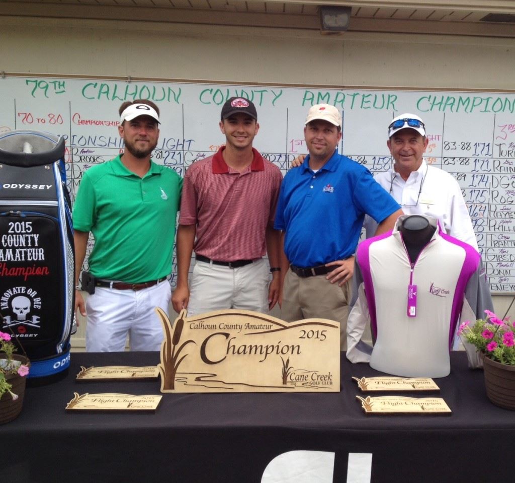 Kyle Turner (second from left) won the third flight after posting a final-round 76.