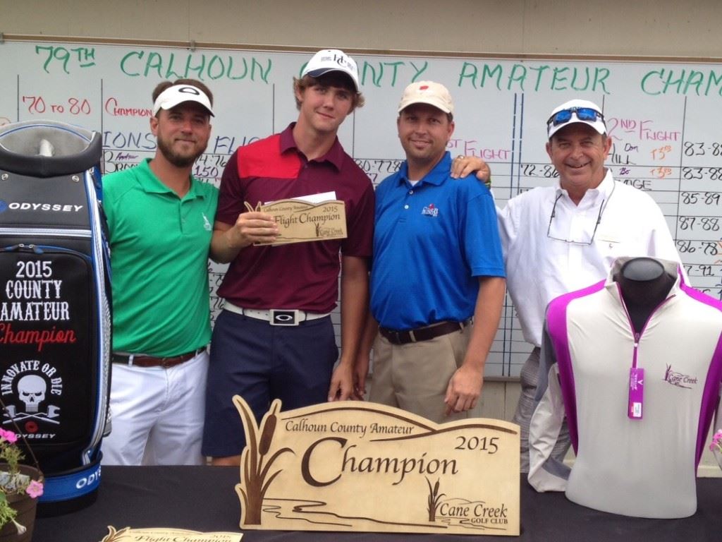 Dakota Yawn (second from left) came out of a three-way playoff to win the first flight. 