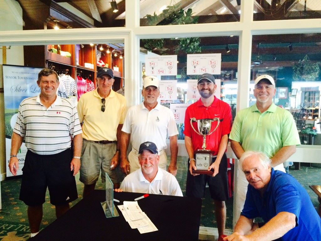 Silver Lakes captain Brennan Clay holds the EA Sports Today Cup flanked by teammates (standing from left) Steve Bailey, Tim MacTaggart, Alan Darnall and Bobby Luttrell and (kneeling from left) Ken Green and Ted Klimasewski. Not pictured Tom Ganshaw.