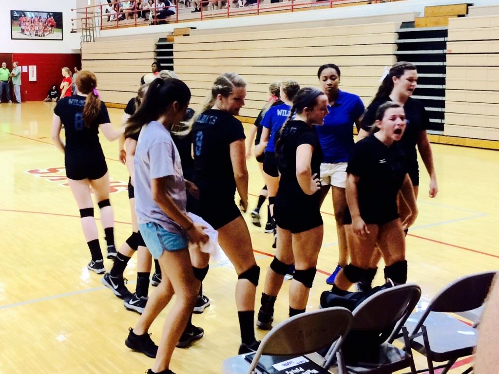 The White Plains volleyball team breaks the huddle during a recent match.