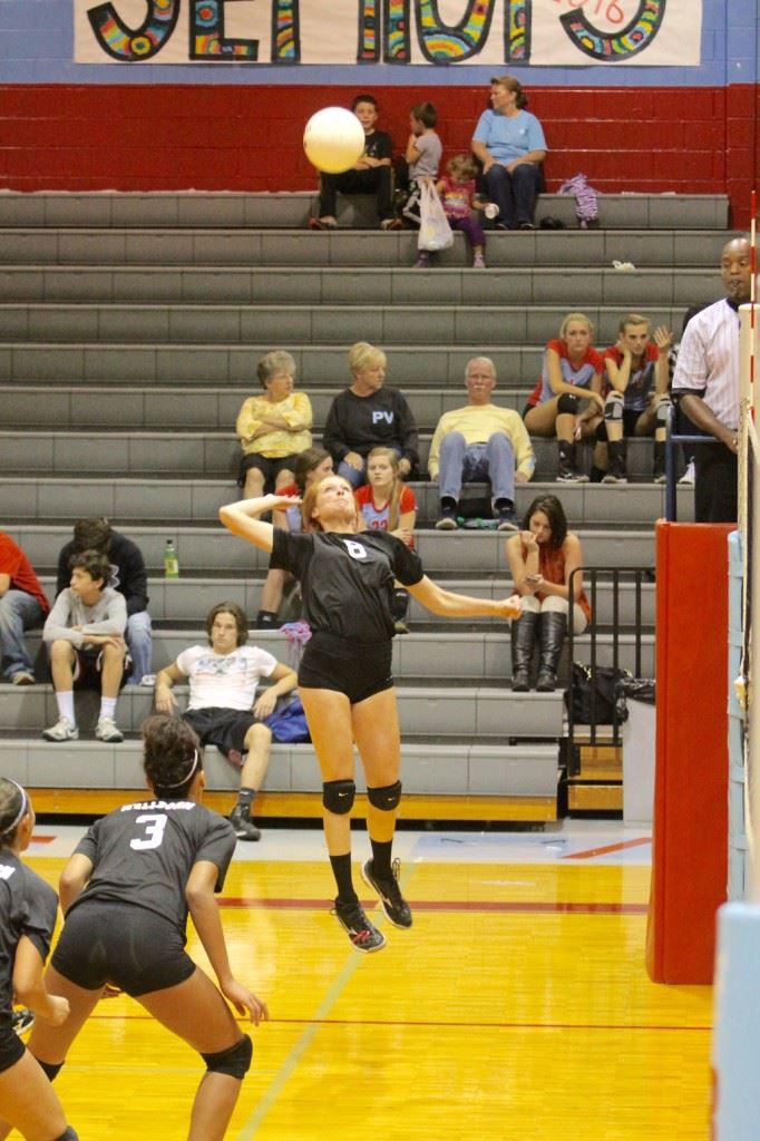 Wellborn's Liz Wyatt goes up for one of her 20 kills in the area semifinals against Weaver. (Photo by Krista Walker)