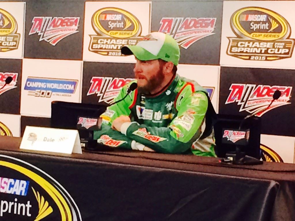 Dale Earnhardt Jr. addresses the media after finishing second in the campingworld.com 500 Sunday at Talladega Superspeedway. On the cover, Joey Logano talks about winning the race.