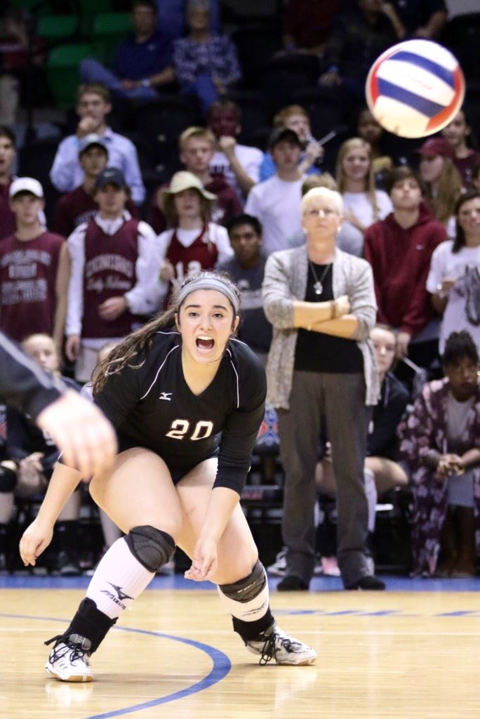 Donoho's Kayla Wallace reacts to the difficulty of getting to a ball during Thursday's Class 1A title match with Meek. (Photo by Kristen Stringer/Krisp Pics Photography)