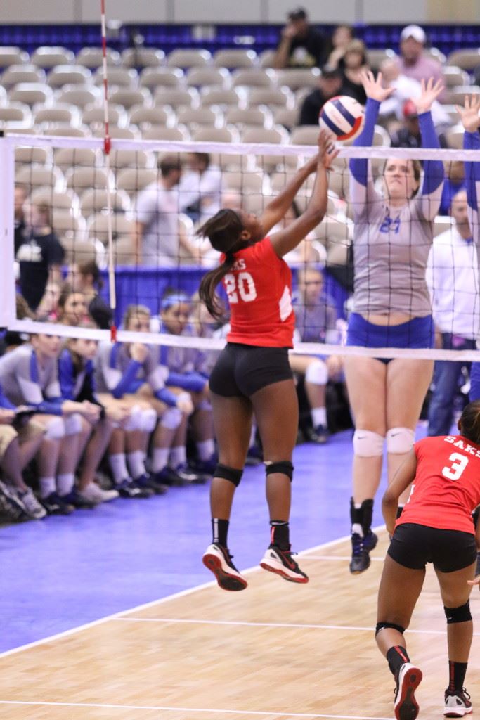 Saks' Jordan Briskey makes a play at the net during Saturday's North Super Regional. (Photo by Kristen Stringer/Krisp Pics Photography)